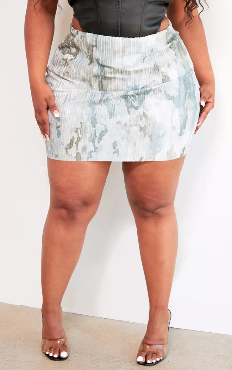 PrettyLittleThing Plus Washed Camo Printed Plisse Micro Mini Skirt< Going Out